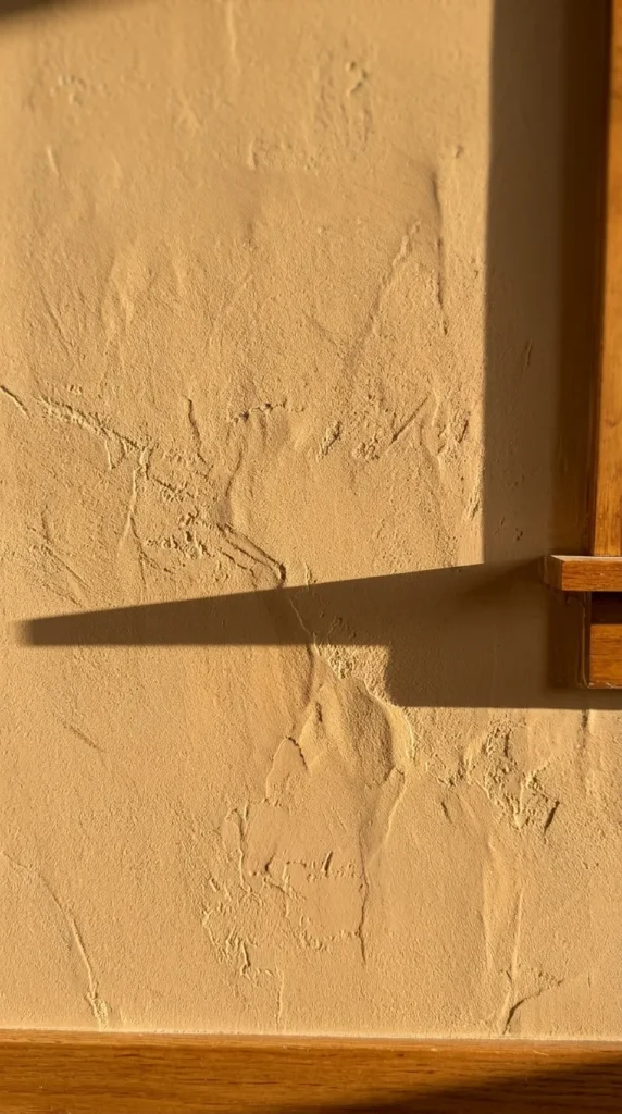 Sand-colored limewash accent wall