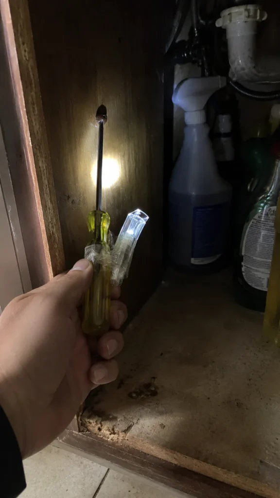 Tape a flashlight to your screwdriver for tight spots