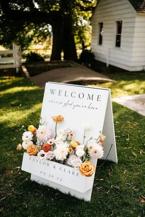 10- Add a Floral Welcome Board