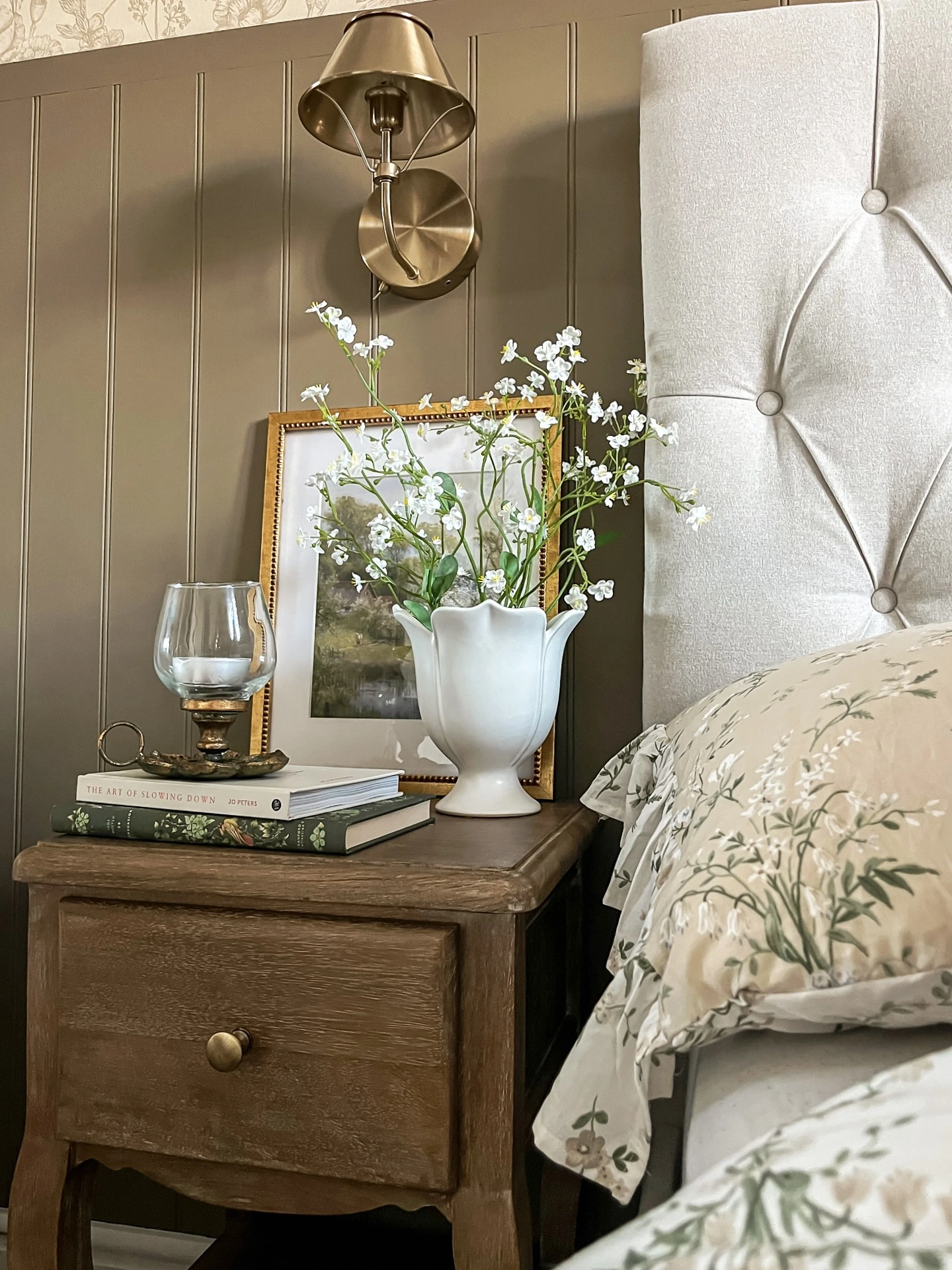 9- Add Artwork Behind a Flower Arrangement