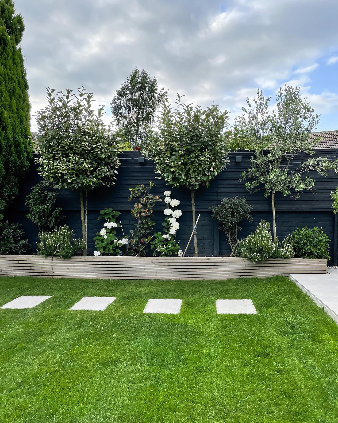 13- Add Topiary to a Modern Fence
