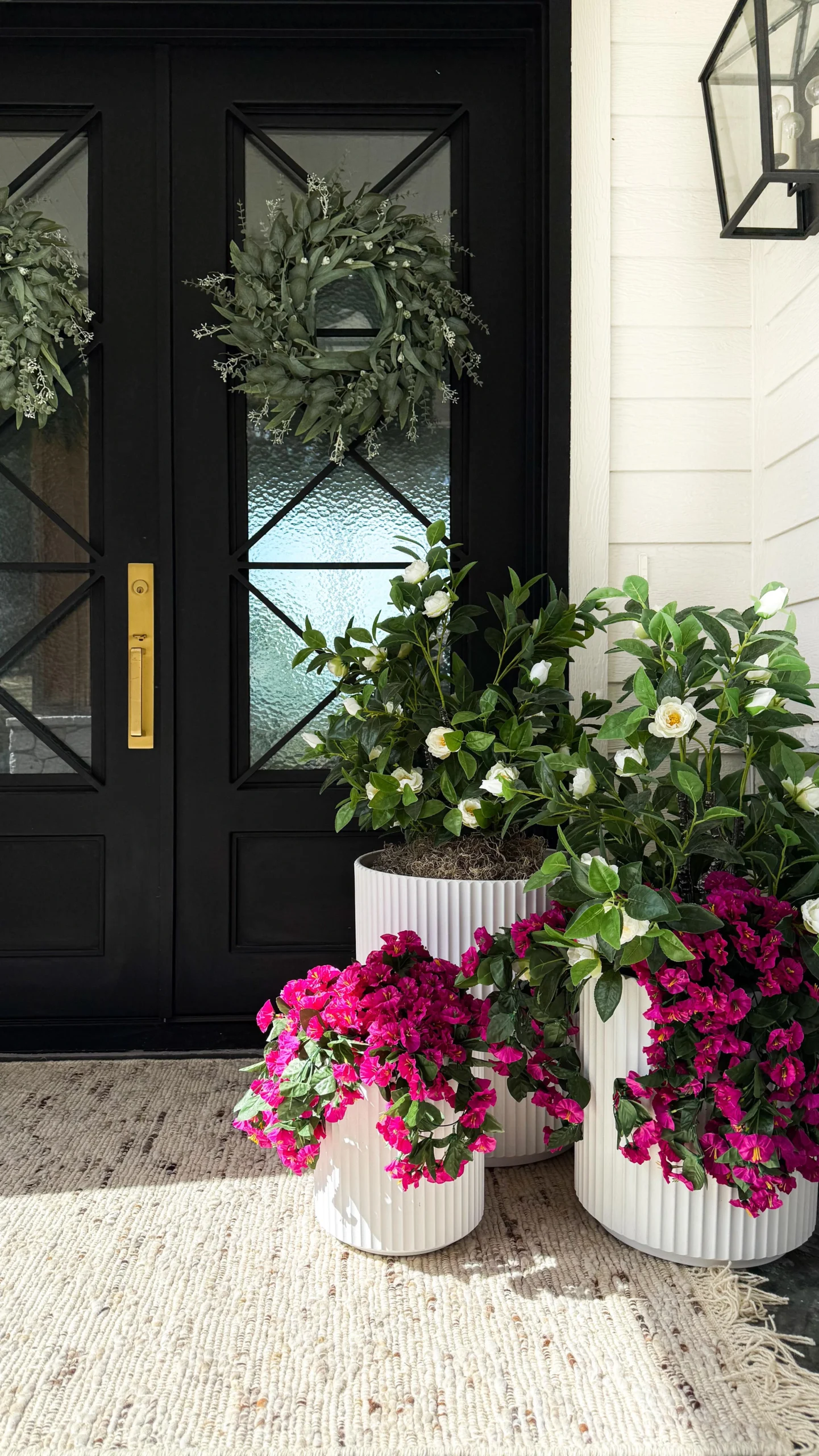 5- Brighten the Door With Ribbed White Planters