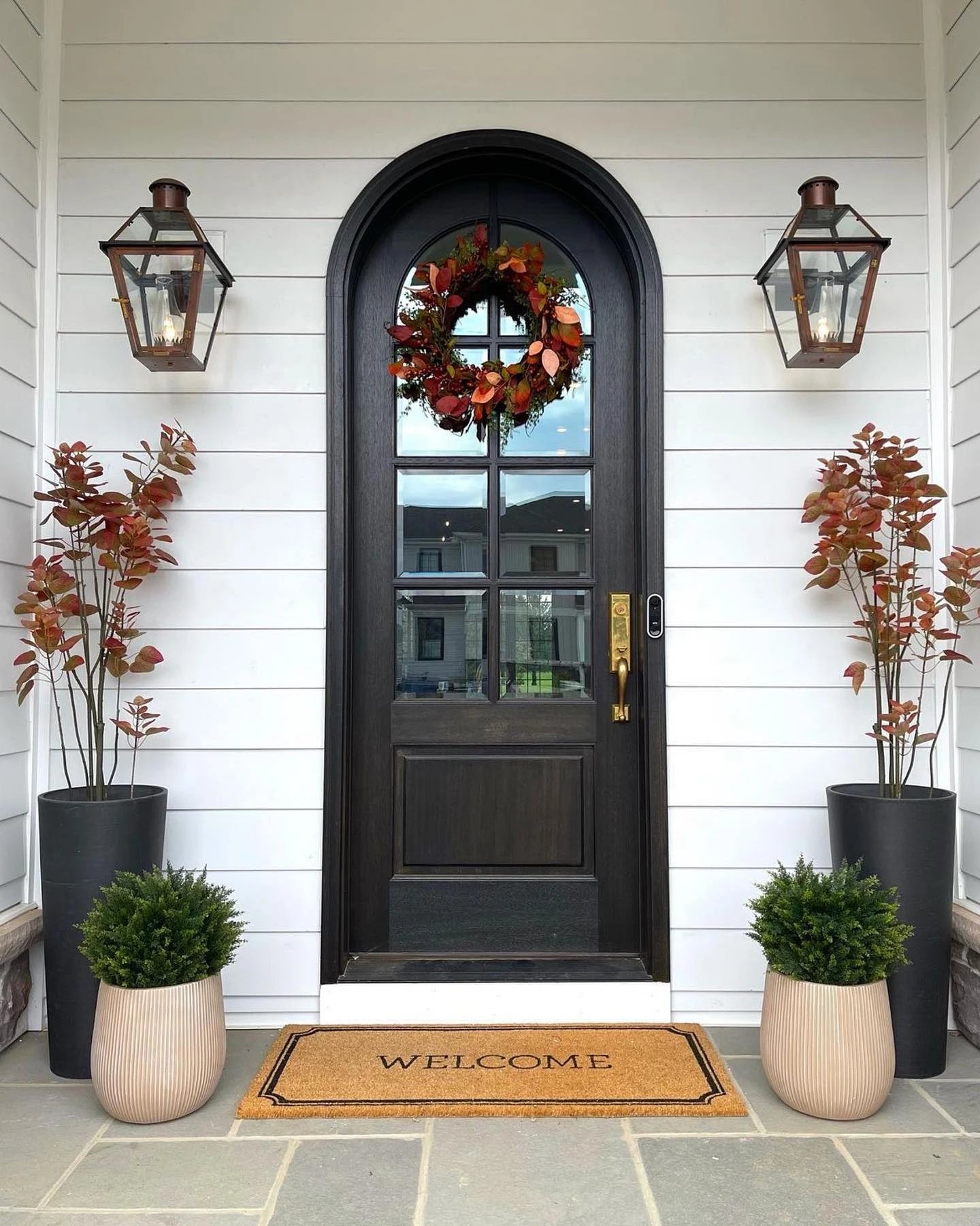 5- Frame the Door with Slim Planters