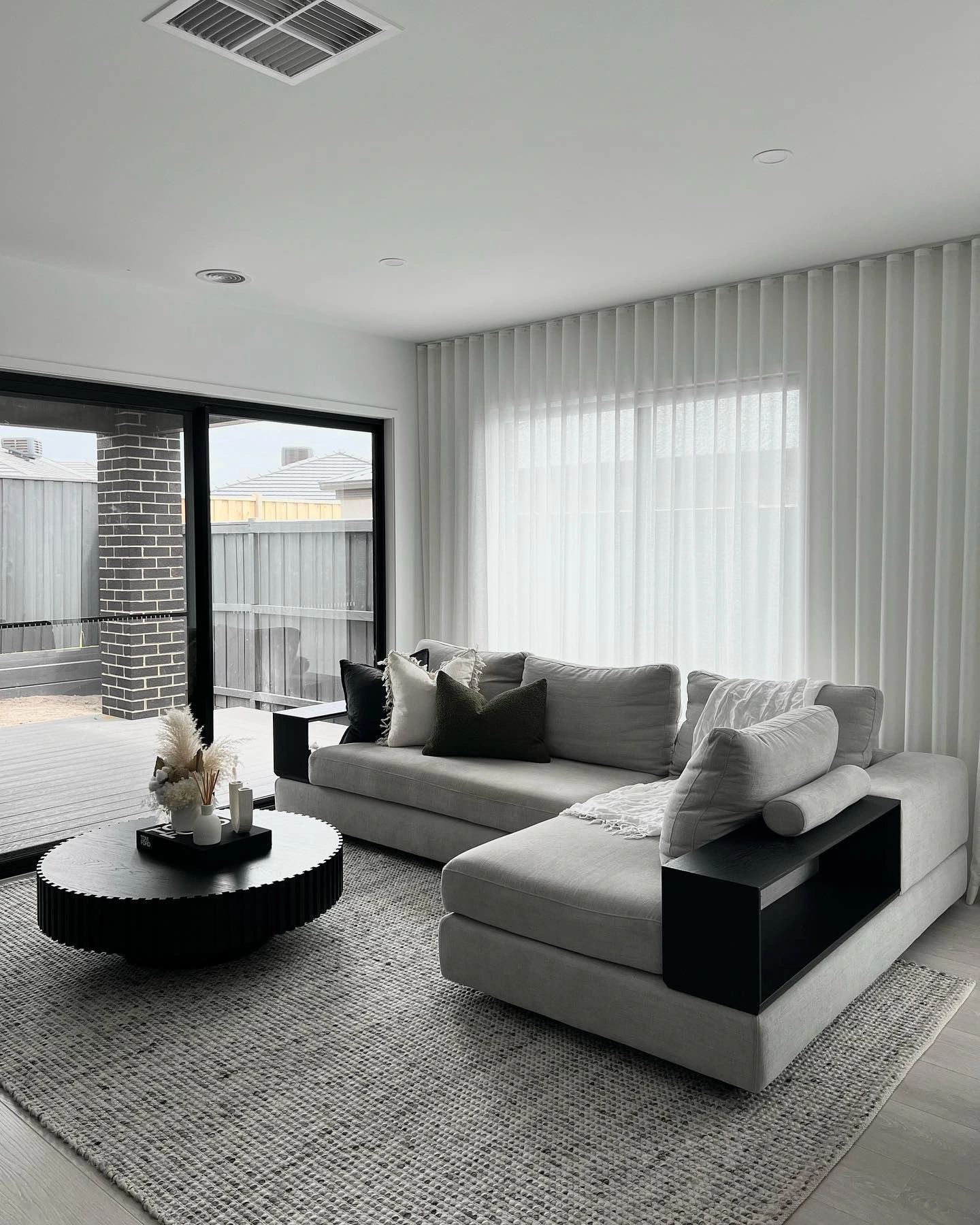 6- Freshen the Couch With Black, White, and Green