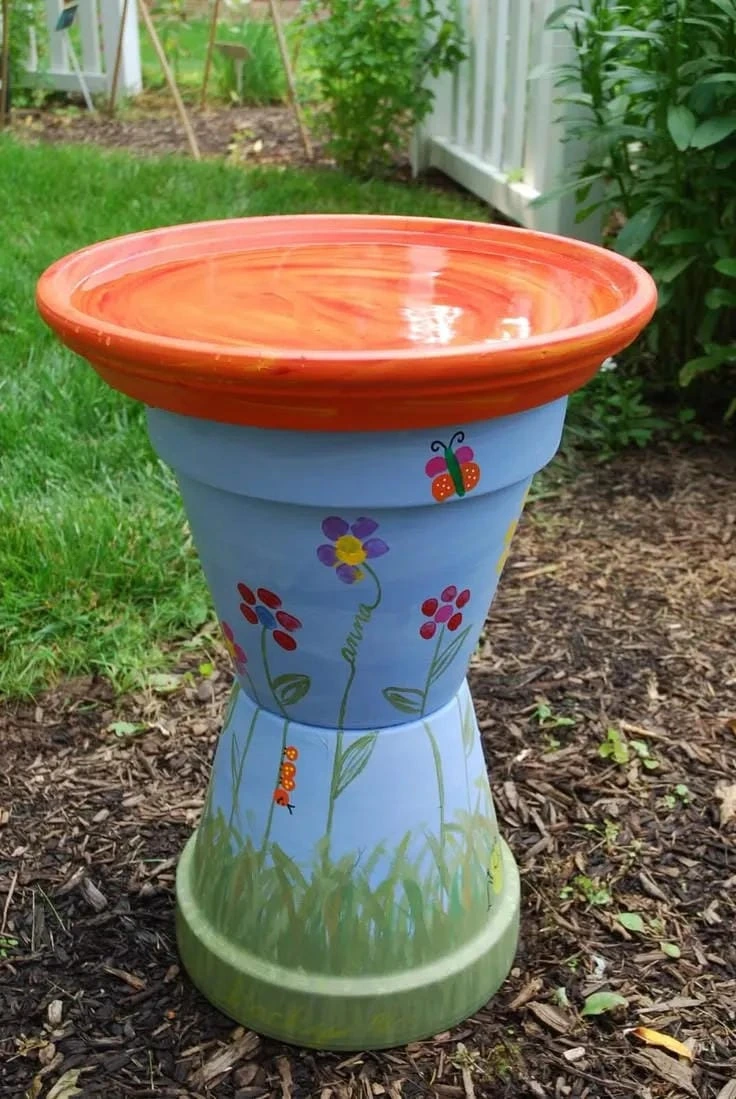 8- Paint a Terracotta Bath with Simple Flowers
