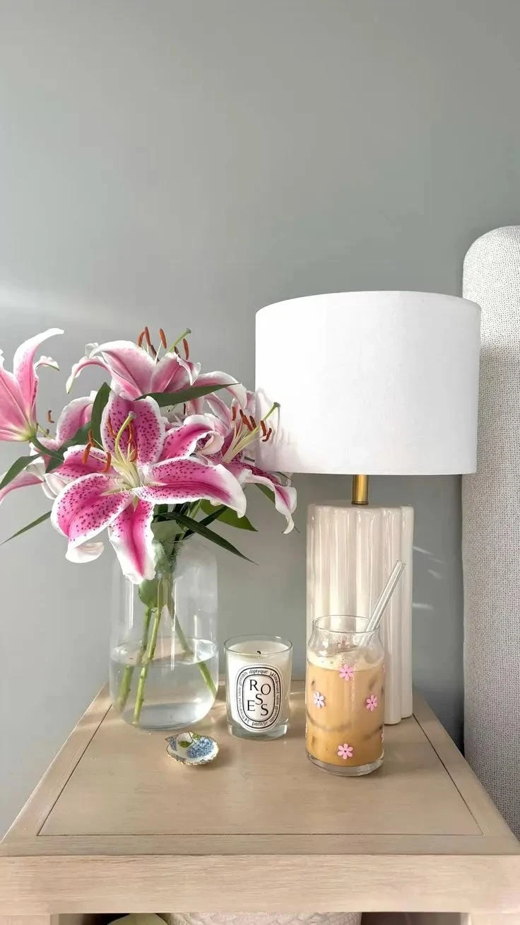 8- Pair a Glass Lamp with Pink Lilies