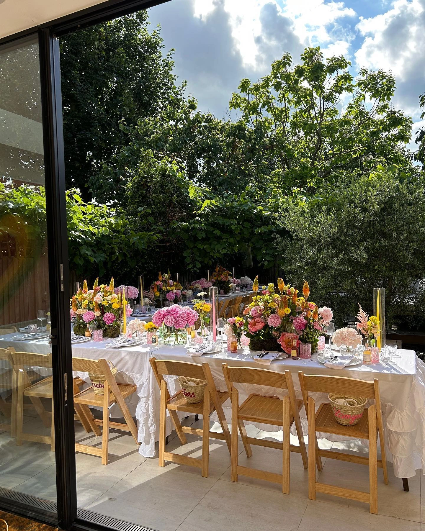 2- Pair Pink Flowers with a White Tablecloth