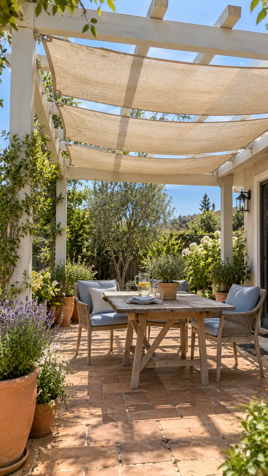 Patio Shade Ideas: off-white backyard pergola with sand shade cloth panels threaded and tied over beams for cool shade below