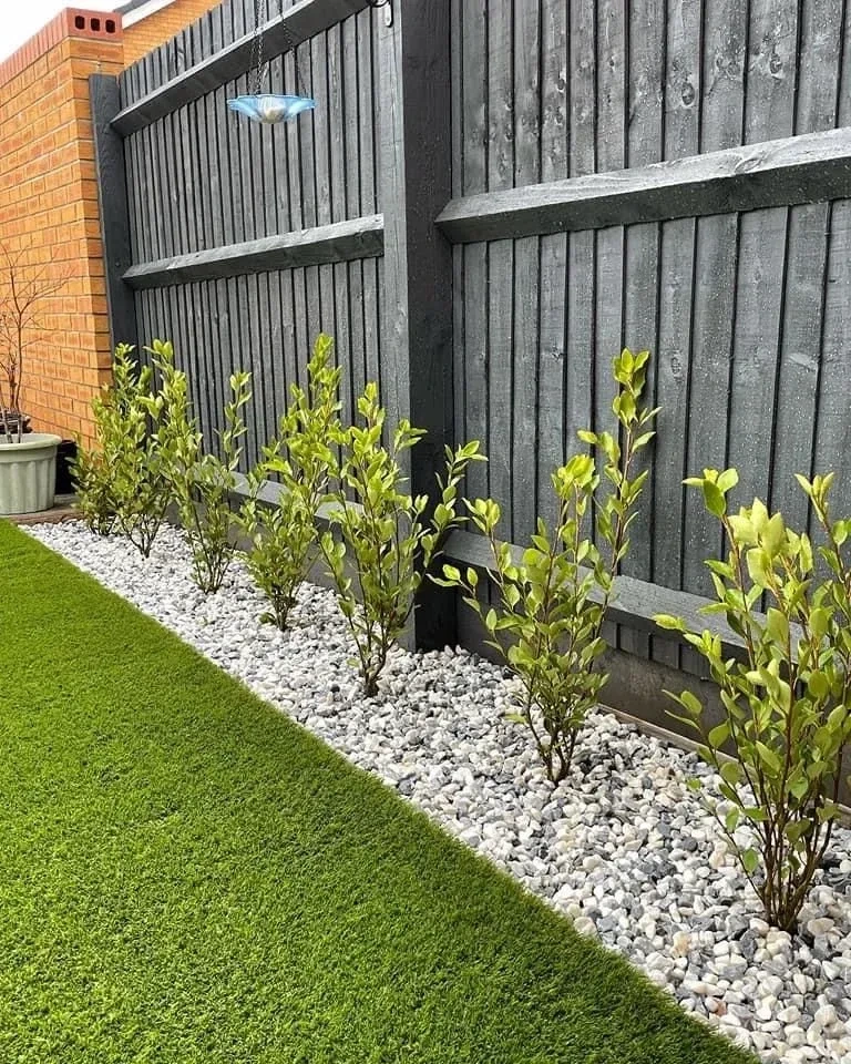 1- Set White Stones Against a Dark Fence