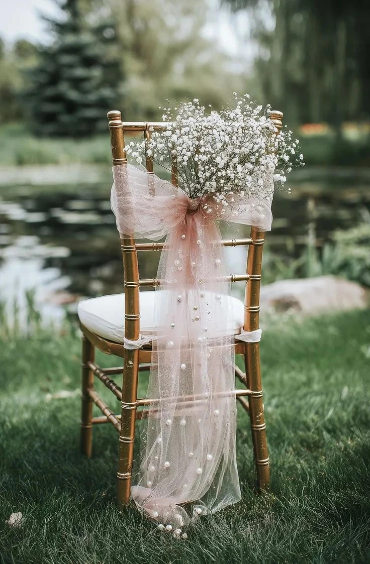 9- Tie Baby's Breath to the Aisle Chairs