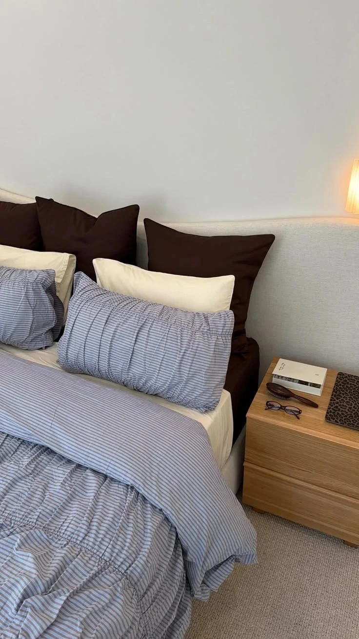 12- Warm Blue Stripes with Brown Pillows