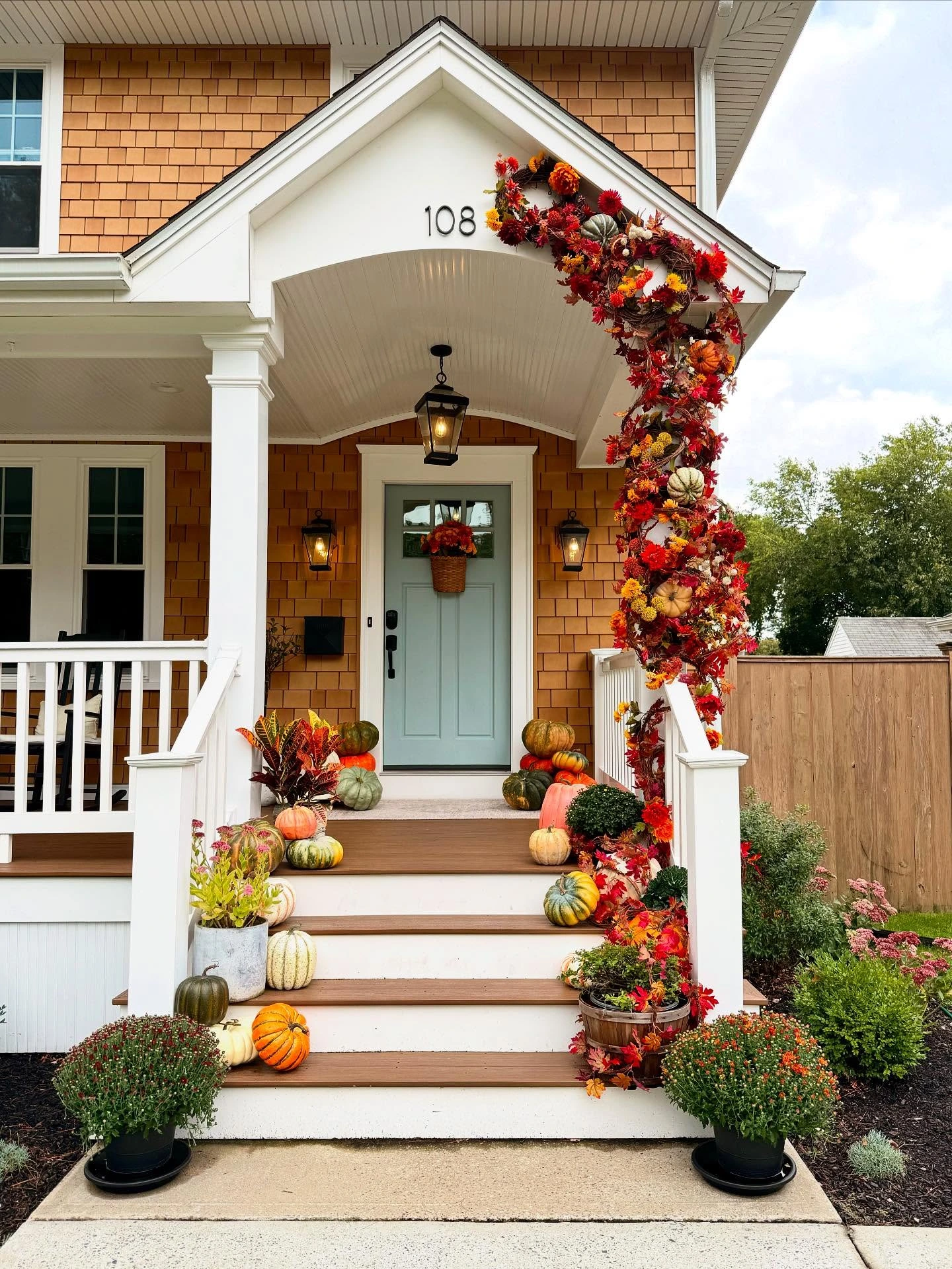 8- Wrap the Railing with Fall Garland