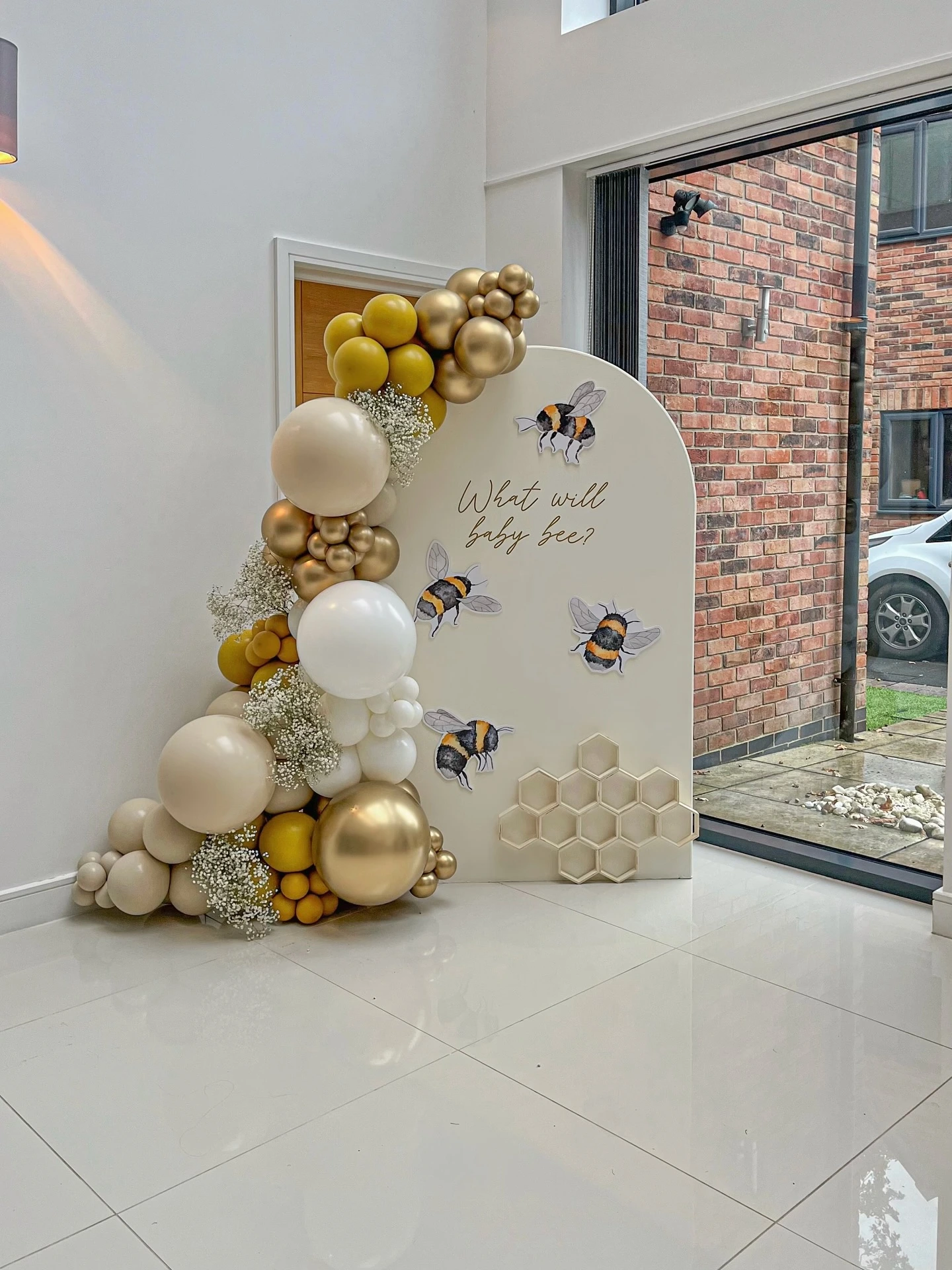 22- Create a Gold, White, and Green Photo Wall