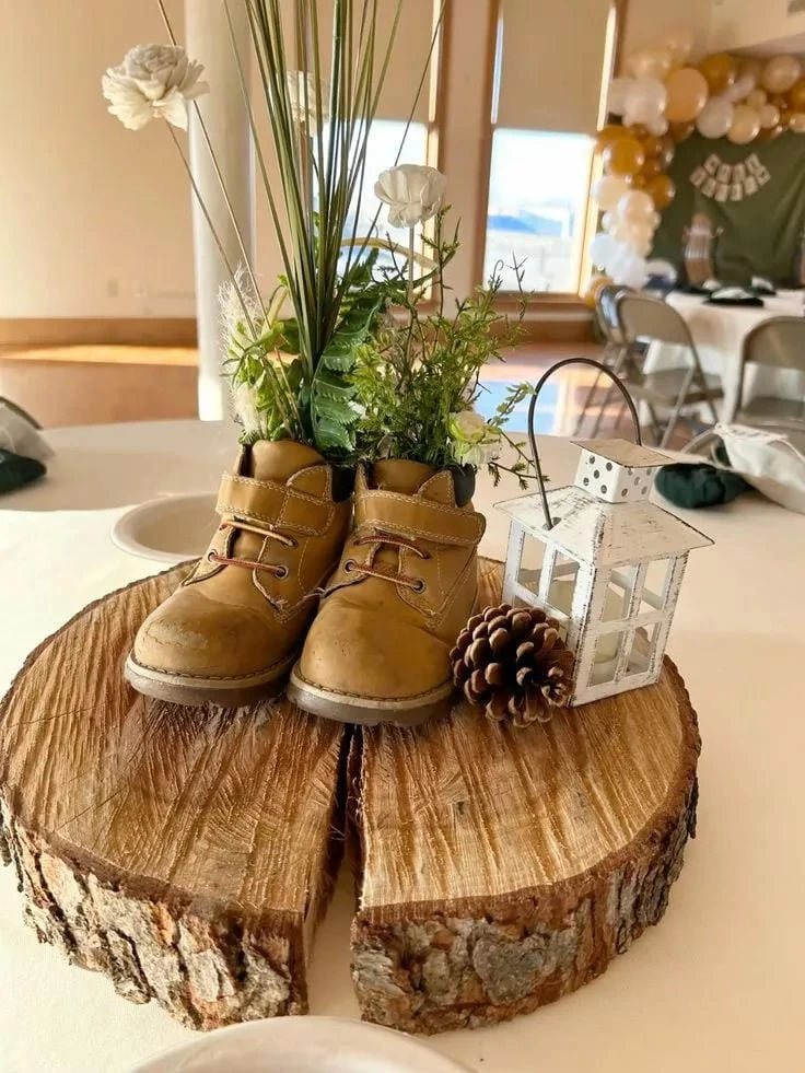 13- Display Baby Boots on a Rustic Wood Slice