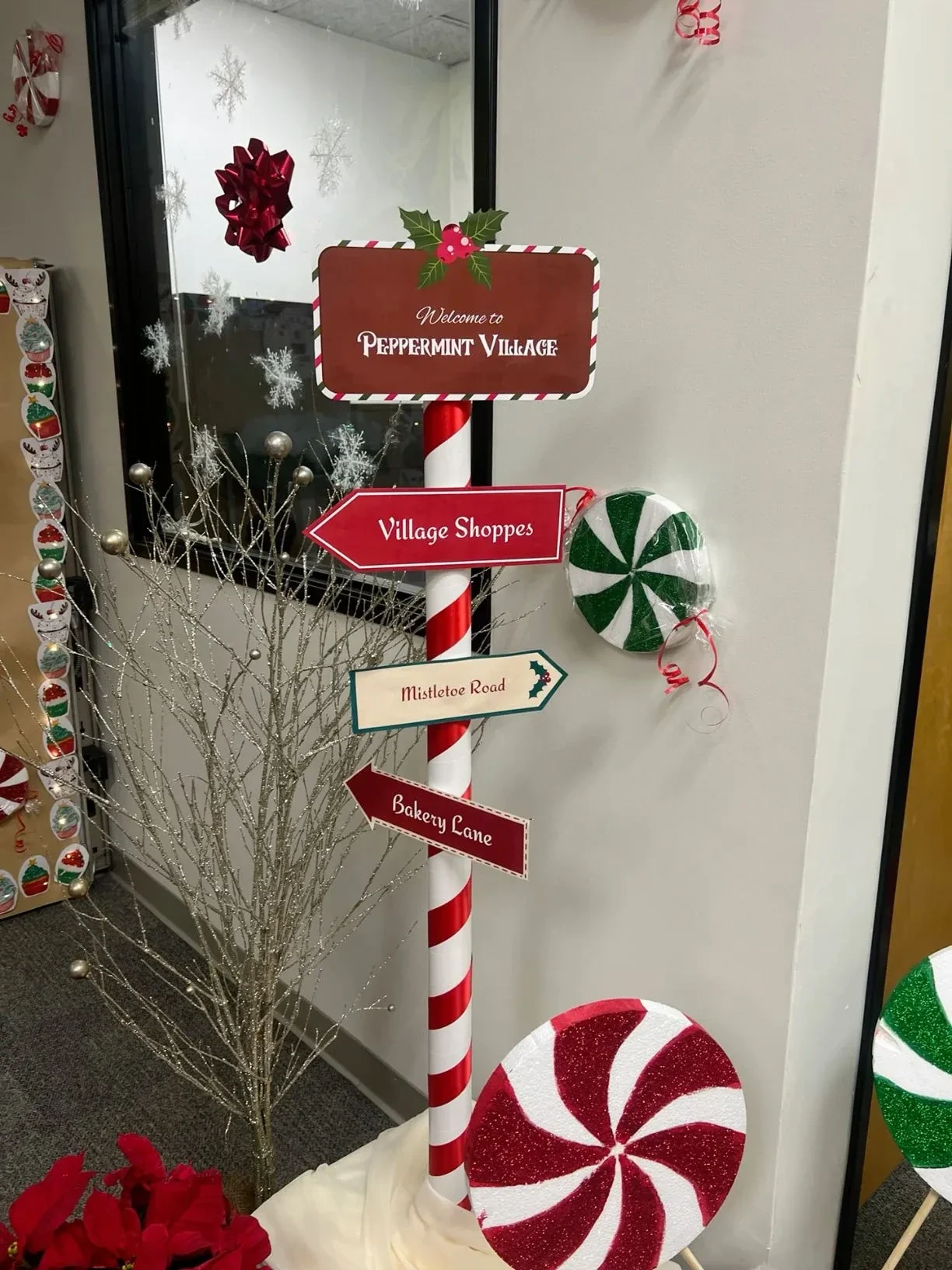11- Hang a Santa's Workshop Aisle Sign
