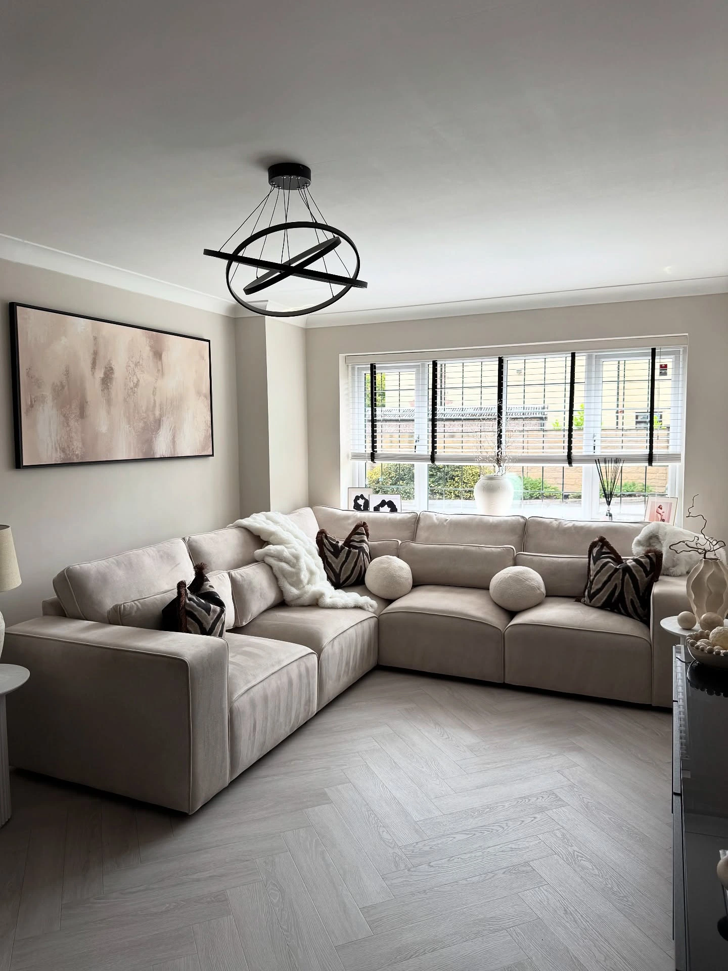 11- Soften a Sectional with Round White Pillows